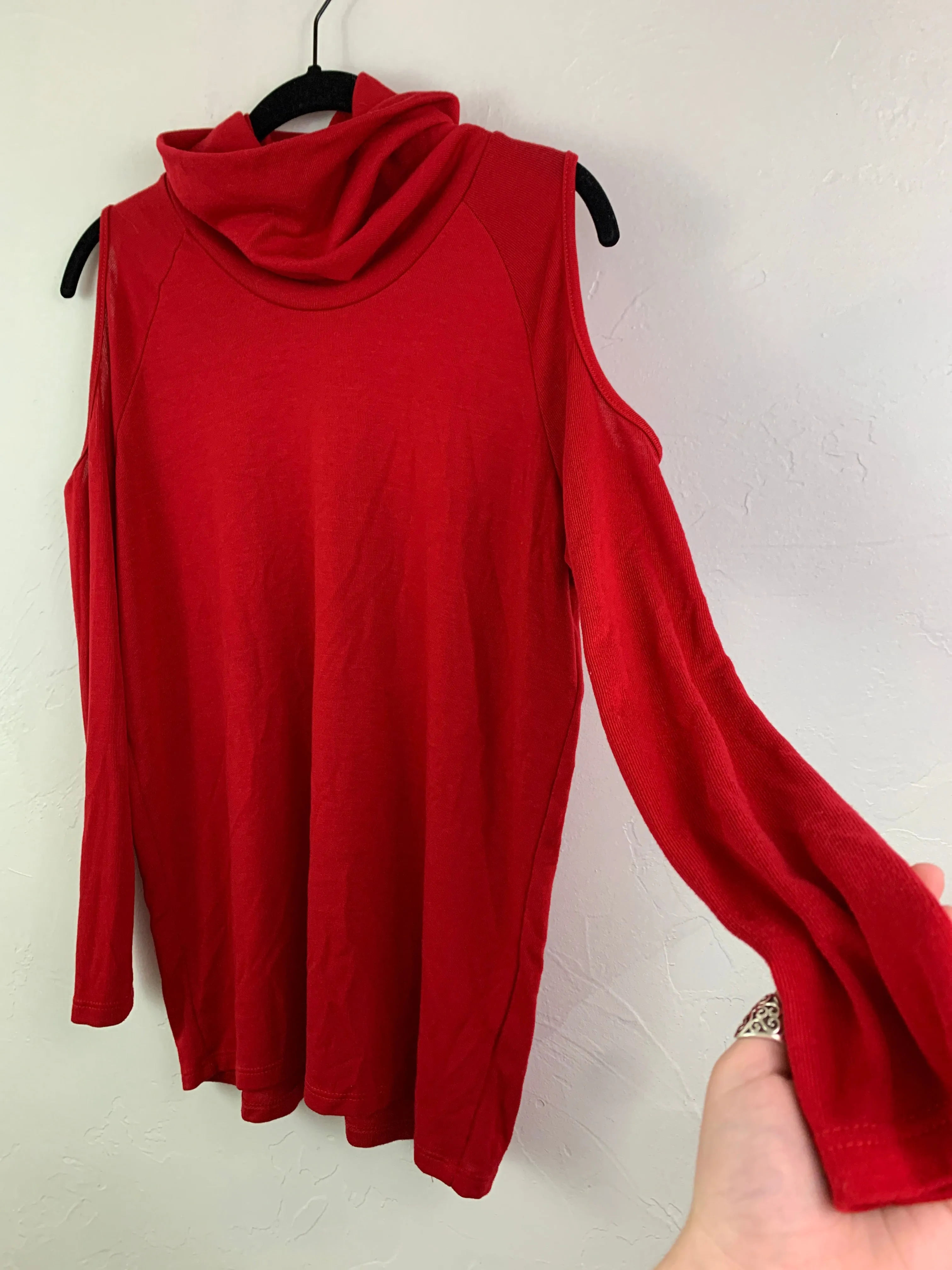 Red turtleneck cutout top